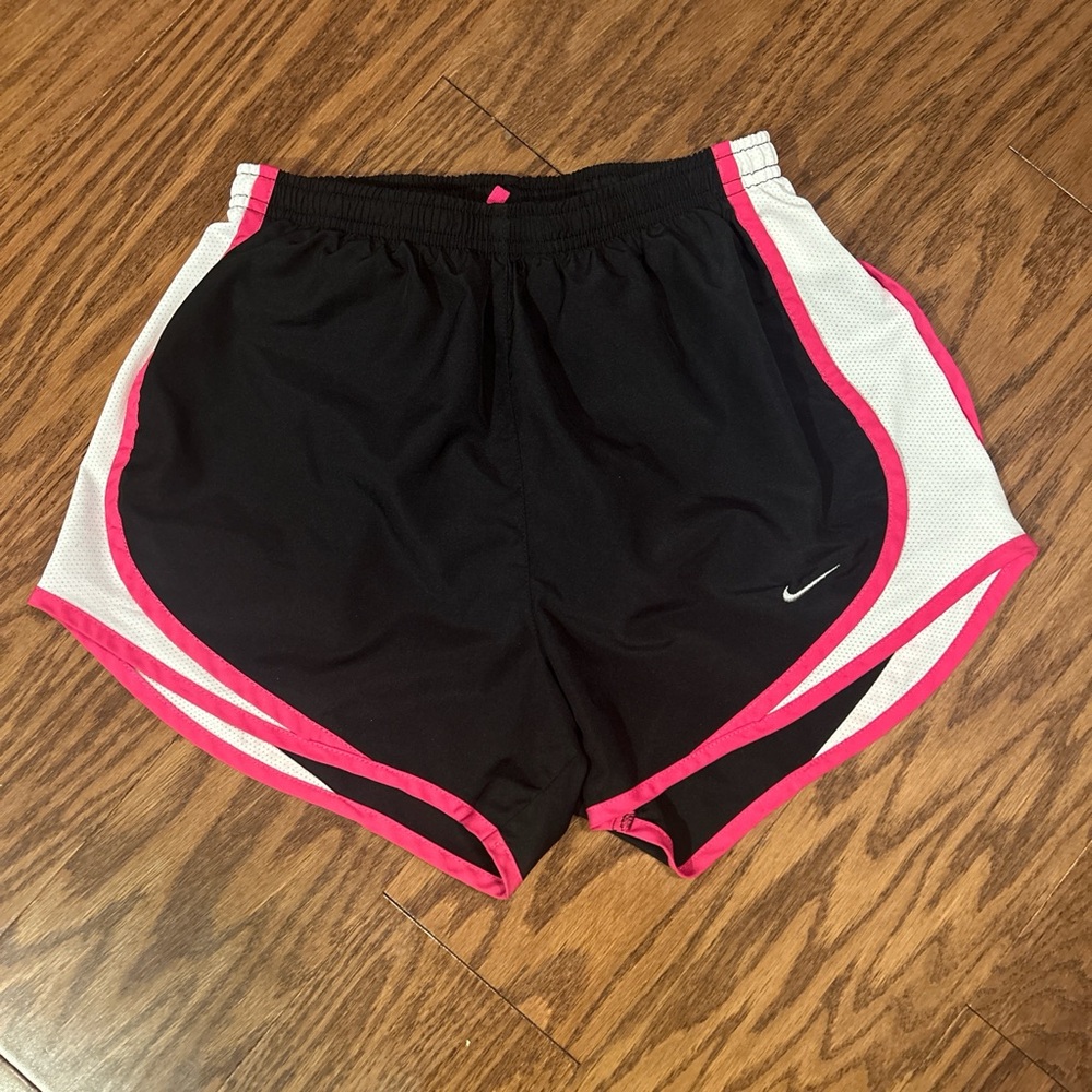 Nike shorts black with pink and white accents; size XS